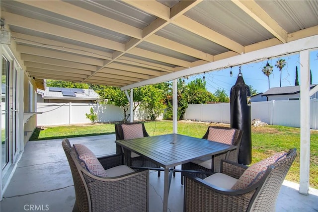 24208 Gilmore St, West Hills, CA 91307 - fenced backyard with outdoor dining area and a patio
