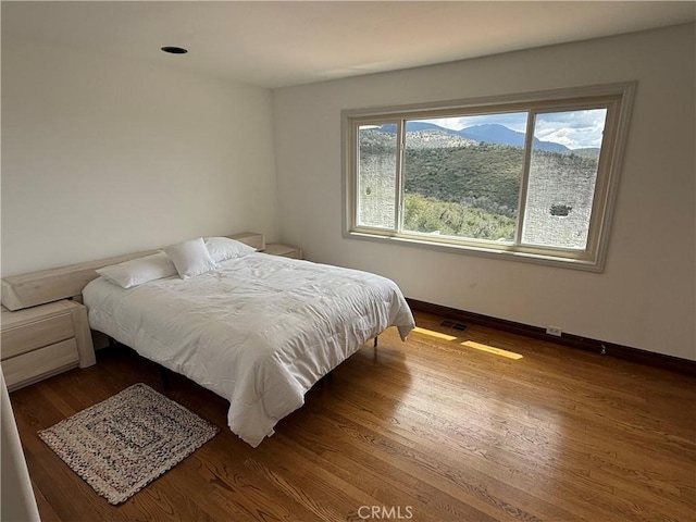 5755 Boulder Creek Rd, Julian, CA 92036 - bedroom with baseboards and wood finished floors