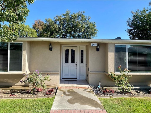 1830 Sunningdale Rd Unit M14-G, Seal Beach, CA 90740 - property entrance featuring stucco siding