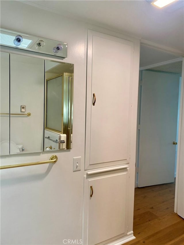 1830 Sunningdale Rd Unit M14-G, Seal Beach, CA 90740 - bathroom with wood finished floors and toilet