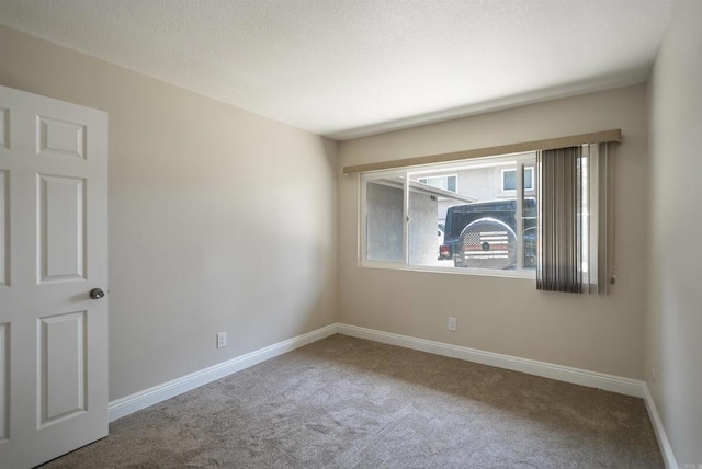 7000 Saranac St Unit 54, La Mesa, CA 91942 - spare room featuring carpet and baseboards