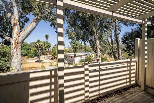 7000 Saranac St Unit 54, La Mesa, CA 91942 - gate with a pergola and view of wooded area