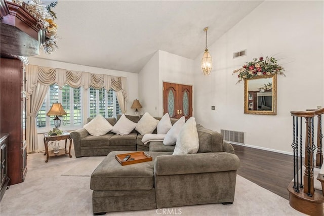 2252 Verbena Ave, Upland, CA 91784 - living room featuring high vaulted ceiling and wood finished floors