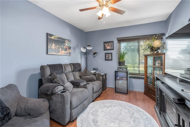 2252 Verbena Ave, Upland, CA 91784 - living area featuring wine cooler, ceiling fan, and wood finished floors