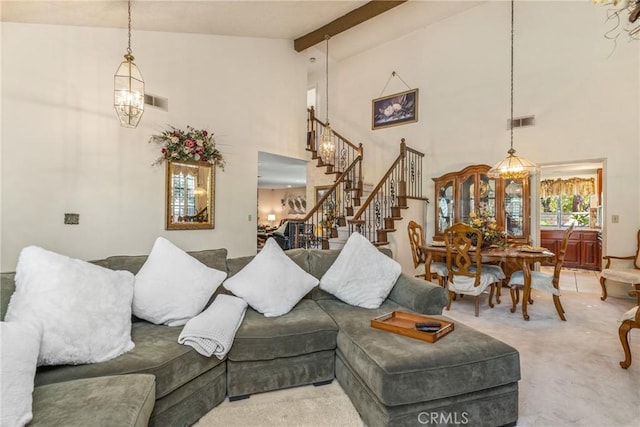2252 Verbena Ave, Upland, CA 91784 - living room with stairway, high vaulted ceiling, beam ceiling, and carpet