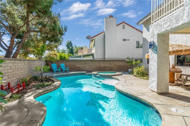 2252 Verbena Ave, Upland, CA 91784 - view of swimming pool featuring a fenced backyard, a patio, and a pool with connected hot tub