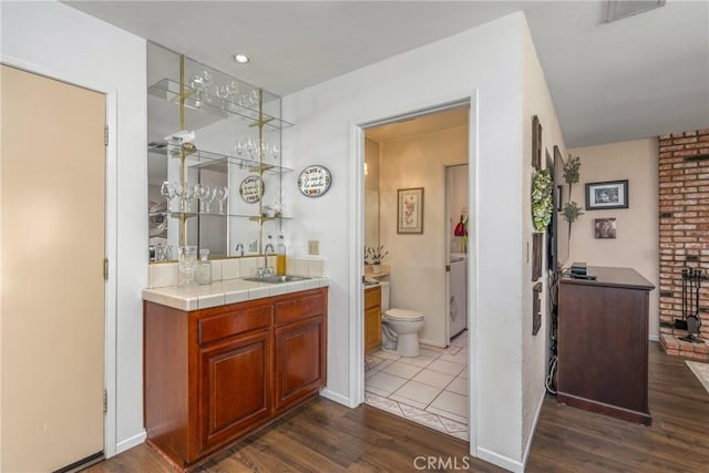 2252 Verbena Ave, Upland, CA 91784 - full bathroom with vanity and wood finished floors