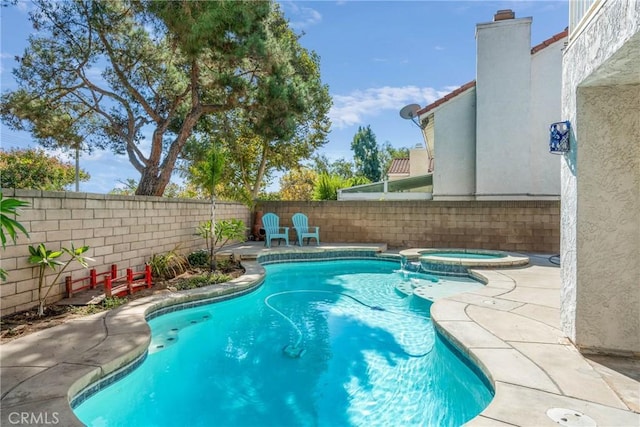 2252 Verbena Ave, Upland, CA 91784 - view of pool featuring a fenced backyard, a pool with connected hot tub, and a patio area