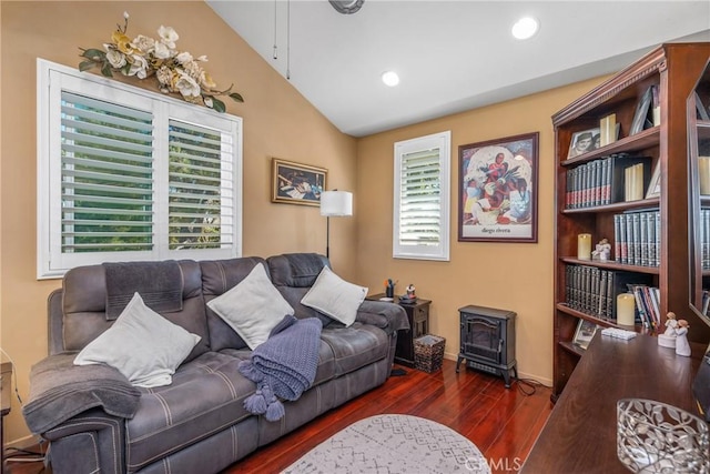 2252 Verbena Ave, Upland, CA 91784 - living room featuring wood finished floors, vaulted ceiling, a wood stove, and recessed lighting