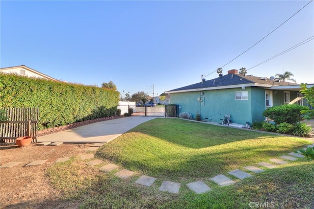 1247 E Marbury St, West Covina, CA 91790 - view of yard featuring a gate