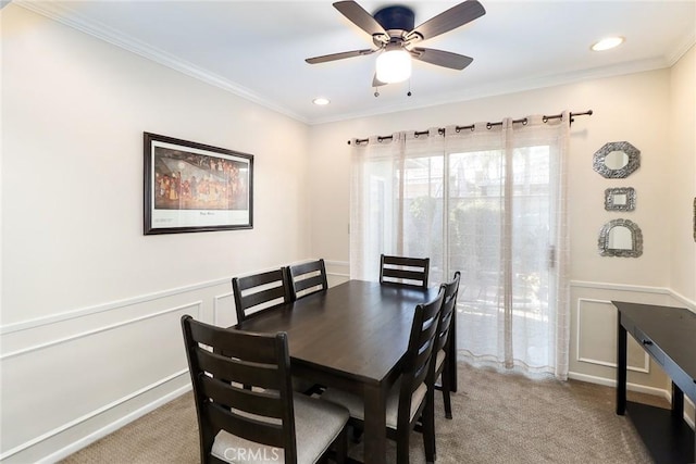 1247 E Marbury St, West Covina, CA 91790 - dining room with carpet flooring, a wainscoted wall, crown molding, ceiling fan, and a decorative wall
