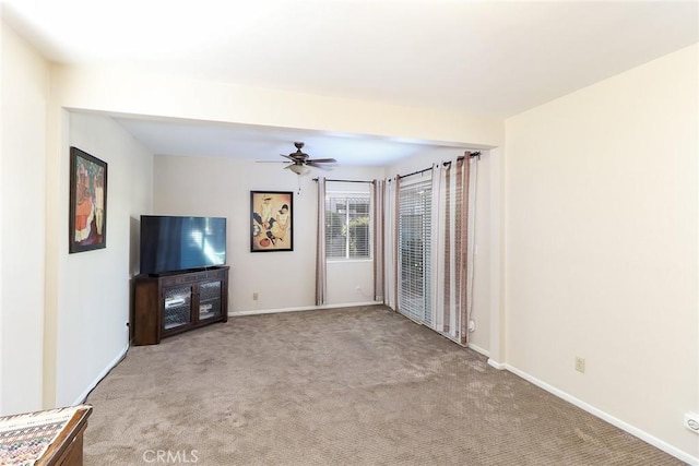 1247 E Marbury St, West Covina, CA 91790 - unfurnished living room featuring ceiling fan and carpet