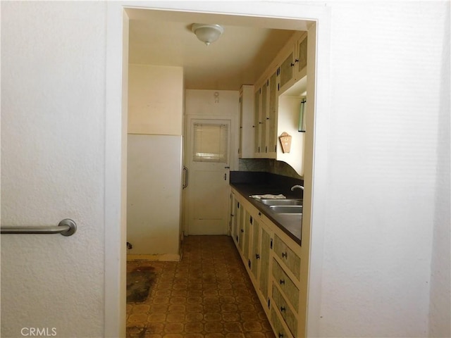 10852 Otsego St, North Hollywood, CA 91601 - kitchen with dark countertops and a sink