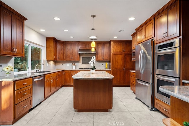 173 Butler Ct, Claremont, CA 91711 - kitchen with appliances with stainless steel finishes, under cabinet range hood, backsplash, recessed lighting, and light stone counters