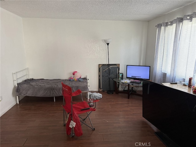 1108 N Rinaldi St, Visalia, CA 93291 - bedroom featuring wood finished floors and a textured ceiling