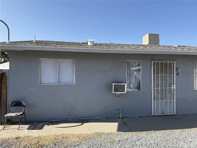 1108 N Rinaldi St, Visalia, CA 93291 - view of home's exterior with stucco siding and a patio