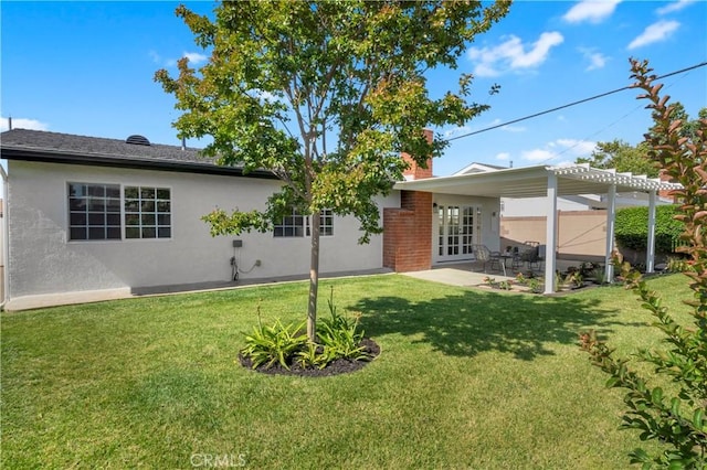 6232 Richmond Ave, Garden Grove, CA 92845 - back of house featuring a pergola, stucco siding, a yard, a patio, and french doors