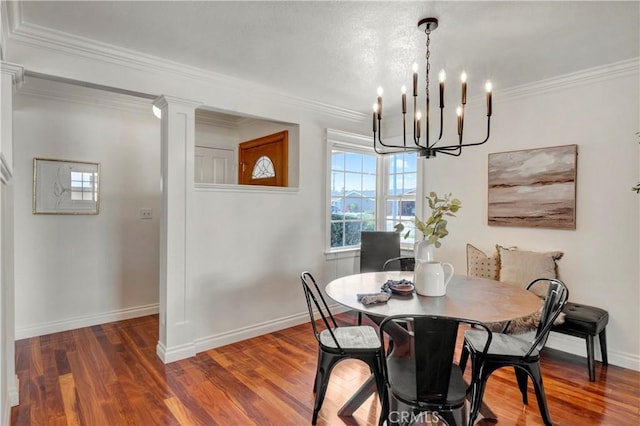 6232 Richmond Ave, Garden Grove, CA 92845 - dining space featuring wood finished floors, a chandelier, and crown molding