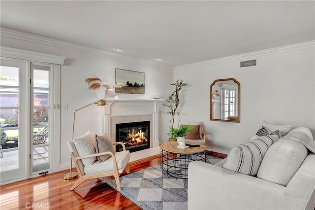 6232 Richmond Ave, Garden Grove, CA 92845 - living area featuring wood finished floors, a high end fireplace, and crown molding