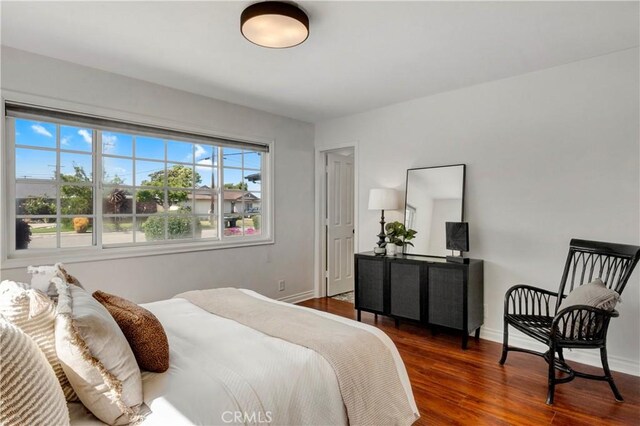 6232 Richmond Ave, Garden Grove, CA 92845 - bedroom featuring wood finished floors and baseboards
