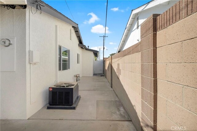 6232 Richmond Ave, Garden Grove, CA 92845 - view of side of home with stucco siding and a patio