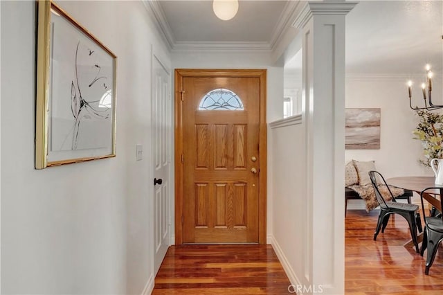 6232 Richmond Ave, Garden Grove, CA 92845 - doorway to outside featuring wood finished floors, crown molding, a chandelier, and decorative columns