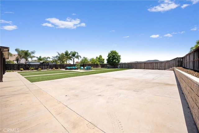 19205 Sterling Hill Ln, Perris, CA 92570 - fenced backyard featuring a patio area