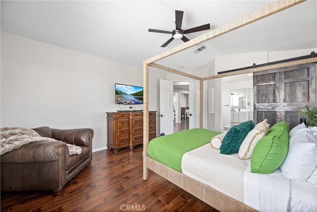 19205 Sterling Hill Ln, Perris, CA 92570 - bedroom featuring lofted ceiling, a barn door, wood finished floors, ensuite bath, and ceiling fan