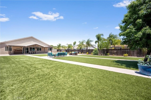 19205 Sterling Hill Ln, Perris, CA 92570 - fenced backyard with outdoor lounge area and a patio area
