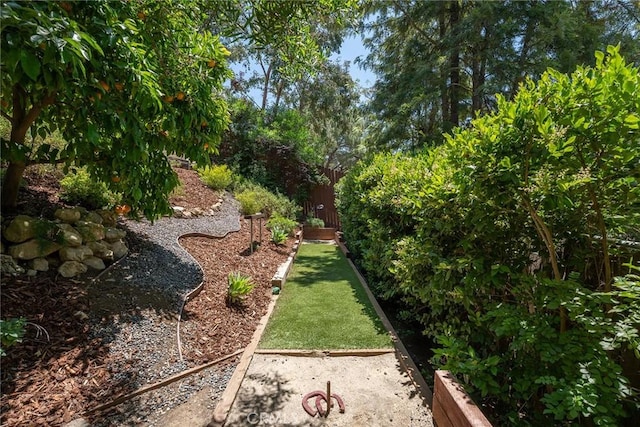 24311 Sylvan Glen Rd, Calabasas, CA 91302 - view of yard with a vegetable garden