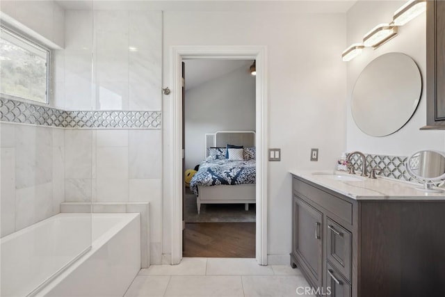 24311 Sylvan Glen Rd, Calabasas, CA 91302 - full bath with ensuite bathroom, tile patterned floors, and double vanity