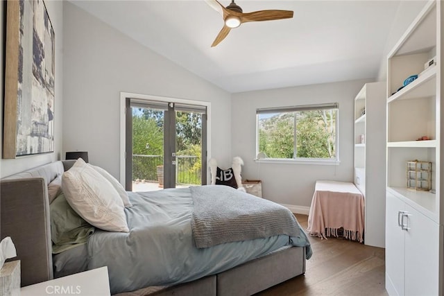 24311 Sylvan Glen Rd, Calabasas, CA 91302 - bedroom with multiple windows, lofted ceiling, access to outside, wood finished floors, and ceiling fan