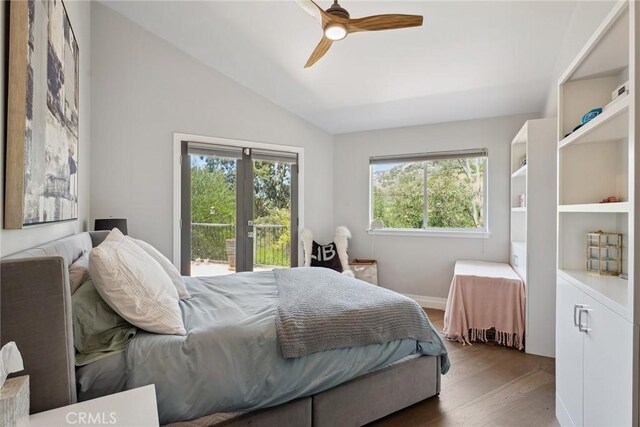 24311 Sylvan Glen Rd, Calabasas, CA 91302 - bedroom featuring access to exterior, lofted ceiling, multiple windows, wood finished floors, and ceiling fan