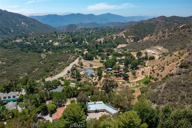 24311 Sylvan Glen Rd, Calabasas, CA 91302 - aerial view of property and surrounding area featuring a mountain backdrop