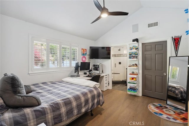 24311 Sylvan Glen Rd, Calabasas, CA 91302 - bedroom featuring dark wood-style floors, high vaulted ceiling, a ceiling fan, and connected bathroom