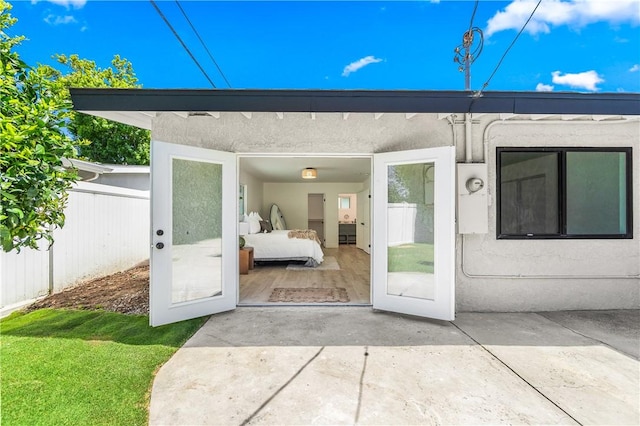 6816 E Driscoll St, Long Beach, CA 90815 - entrance to property with stucco siding and a patio area