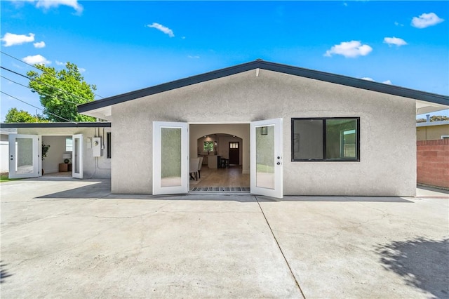 6816 E Driscoll St, Long Beach, CA 90815 - back of house with stucco siding and a patio