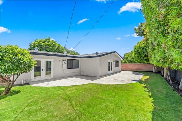 6816 E Driscoll St, Long Beach, CA 90815 - rear view of house featuring french doors, stucco siding, a fenced backyard, and a patio area