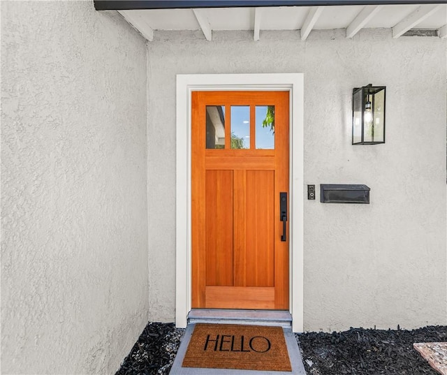 6816 E Driscoll St, Long Beach, CA 90815 - property entrance featuring stucco siding