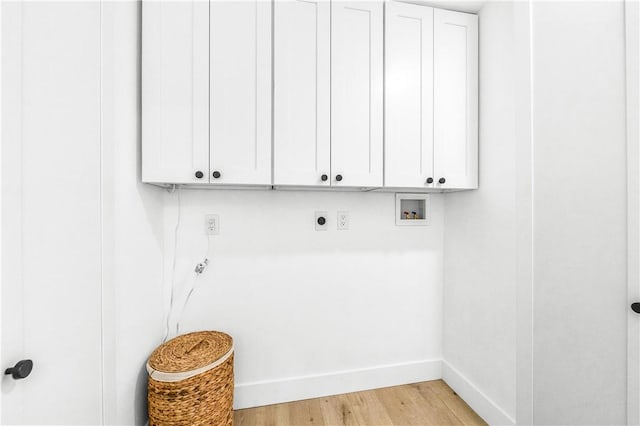 6816 E Driscoll St, Long Beach, CA 90815 - laundry room with cabinet space, washer hookup, electric dryer hookup, and light wood-type flooring