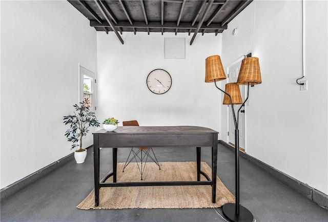 6816 E Driscoll St, Long Beach, CA 90815 - office space featuring finished concrete floors, a towering ceiling, and beamed ceiling