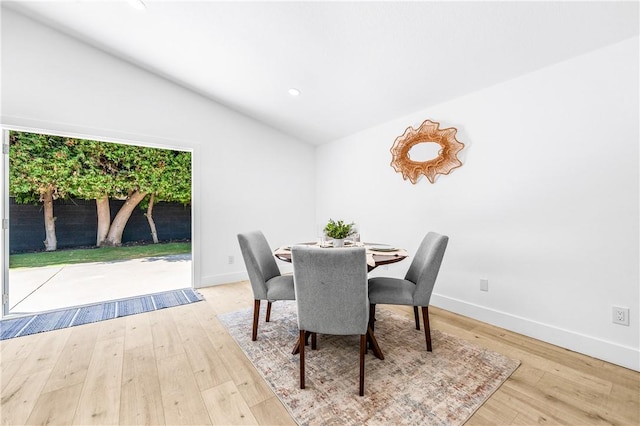 6816 E Driscoll St, Long Beach, CA 90815 - dining area featuring vaulted ceiling, wood finished floors, and recessed lighting