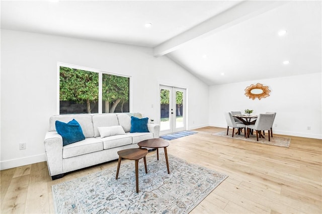 6816 E Driscoll St, Long Beach, CA 90815 - living room with french doors, light wood-style flooring, and recessed lighting