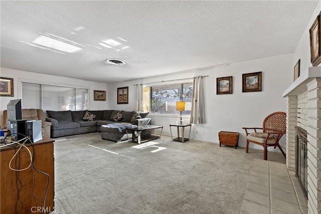 57795 El Dorado Dr, Yucca Valley, CA 92284 - living area with a textured ceiling, light carpet, and a fireplace