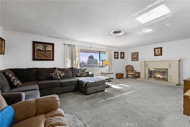 57795 El Dorado Dr, Yucca Valley, CA 92284 - carpeted living area featuring a textured ceiling and a fireplace