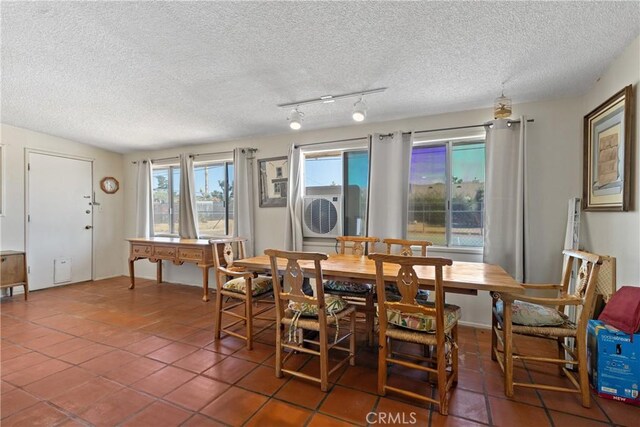57795 El Dorado Dr, Yucca Valley, CA 92284 - dining space with a textured ceiling and tile patterned flooring