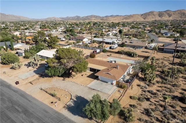 57795 El Dorado Dr, Yucca Valley, CA 92284 - aerial view of property's location featuring mountains and nearby suburban area
