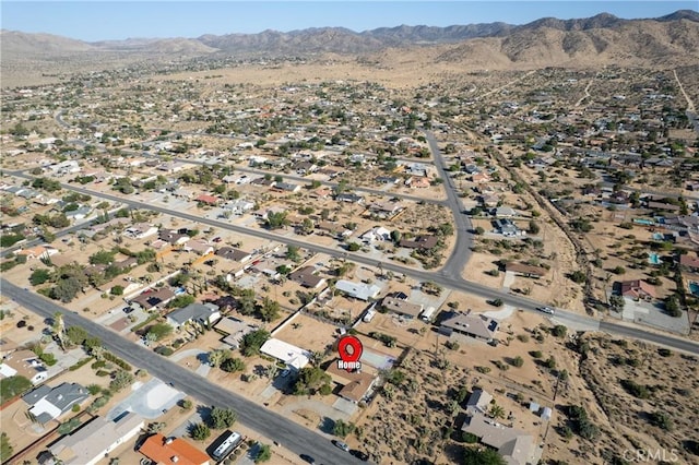 57795 El Dorado Dr, Yucca Valley, CA 92284 - aerial overview of property's location with mountains