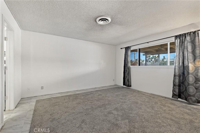 57795 El Dorado Dr, Yucca Valley, CA 92284 - unfurnished room with a textured ceiling