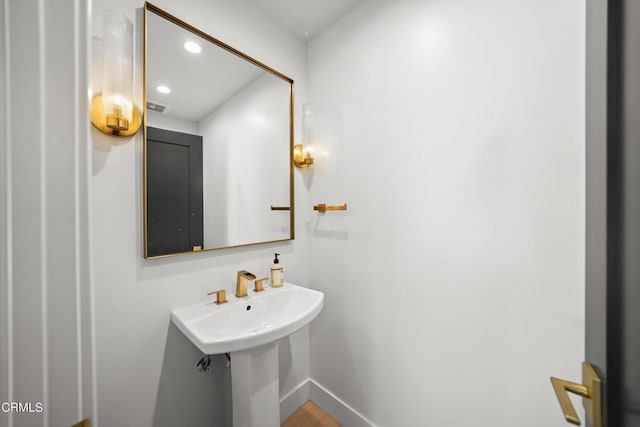 9518 Forbes Ave, Northridge, CA 91343 - bathroom with recessed lighting and wood finished floors